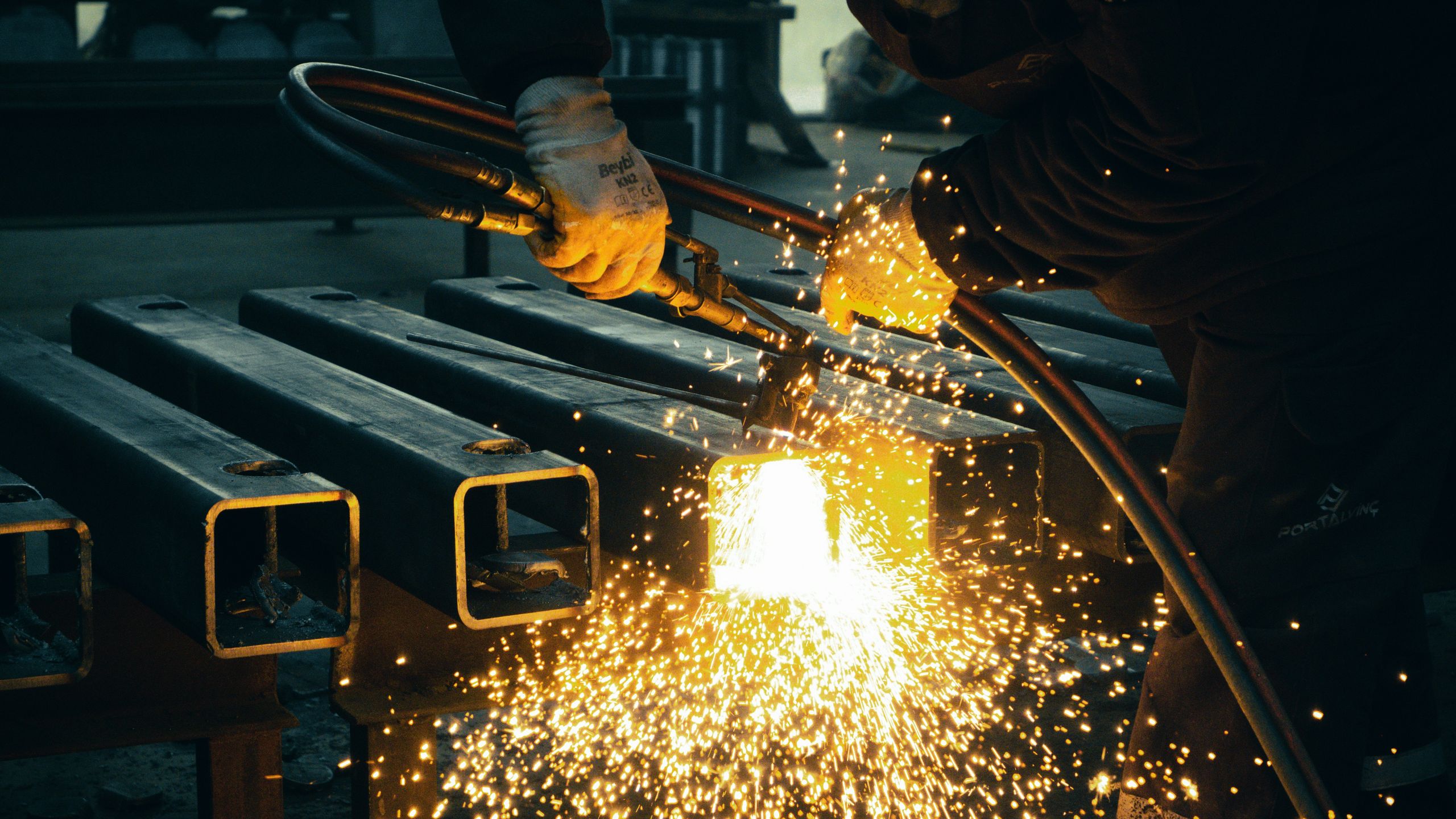 industrial technician working safely on turbine manufacturing equipment
